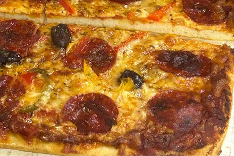 Freshly Sliced Pepperoni Pizza