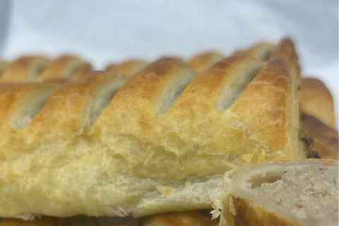 Close up photograph of a sausage roll